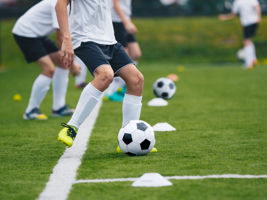 youth soccer practice in a soccer coaching session